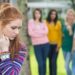 In this image a girl with symptoms of social anxiety