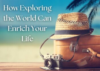 Travel essentials including a suitcase, straw hat, and vintage camera with a beach background.