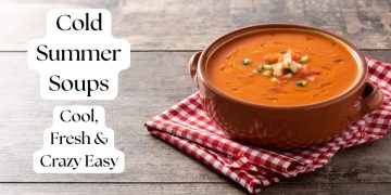 Cold summer soups served in a clay bowl with fresh garnish.